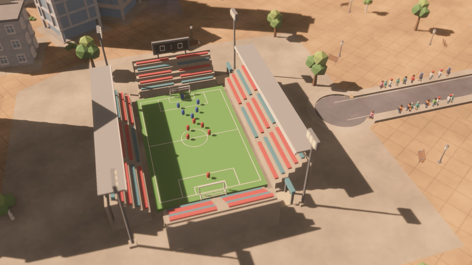 A football match in a small stadium with red stands